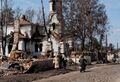Вид на церковь Иоанна Крестителя со стороны улицы Фрунзе. За церковью улица Ивановская. Кадр немецкой кинохроники. Июль-август 1941 год